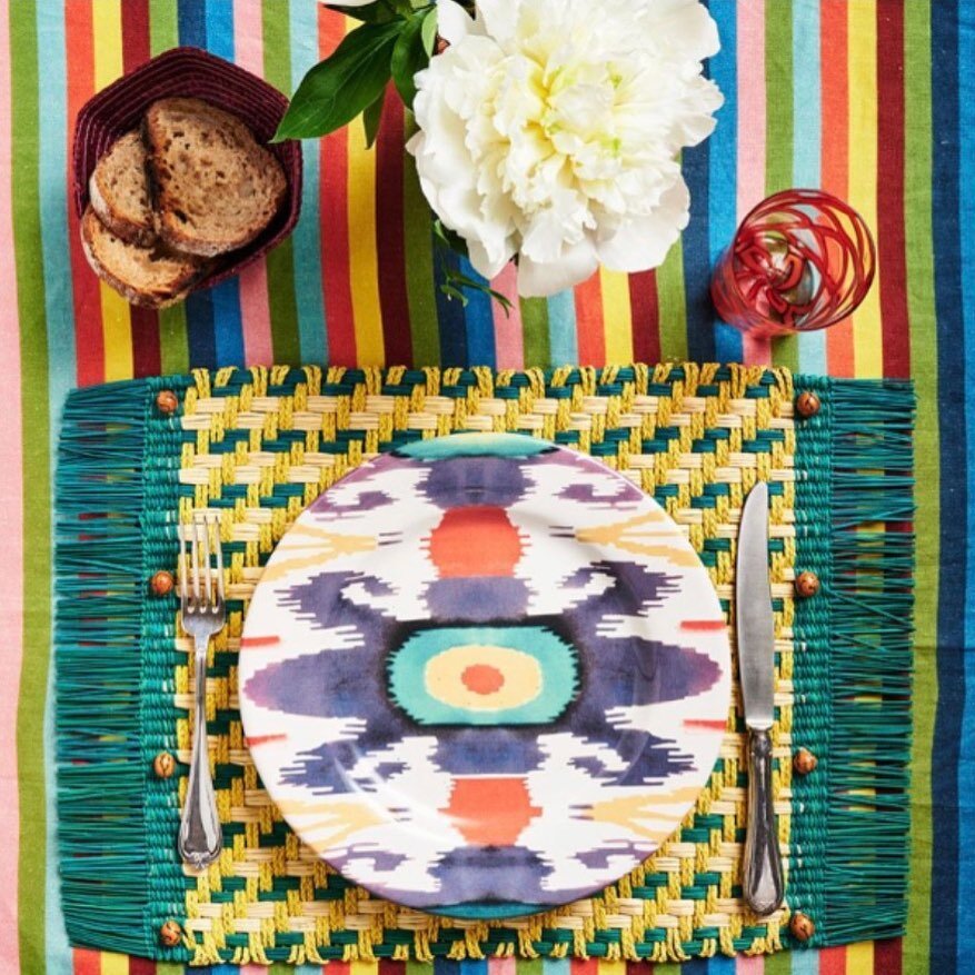 The eclectic perfection of color, pattern and texture...the dinner plate&rsquo;s ikat pattern is quite extraordinary💜🧡💛🤍 @cabanamagazine #casacabana #cabanamood #naples #italythebeautiful #tablescapedining #tablescapes #dinnerpartygoals #colorpat