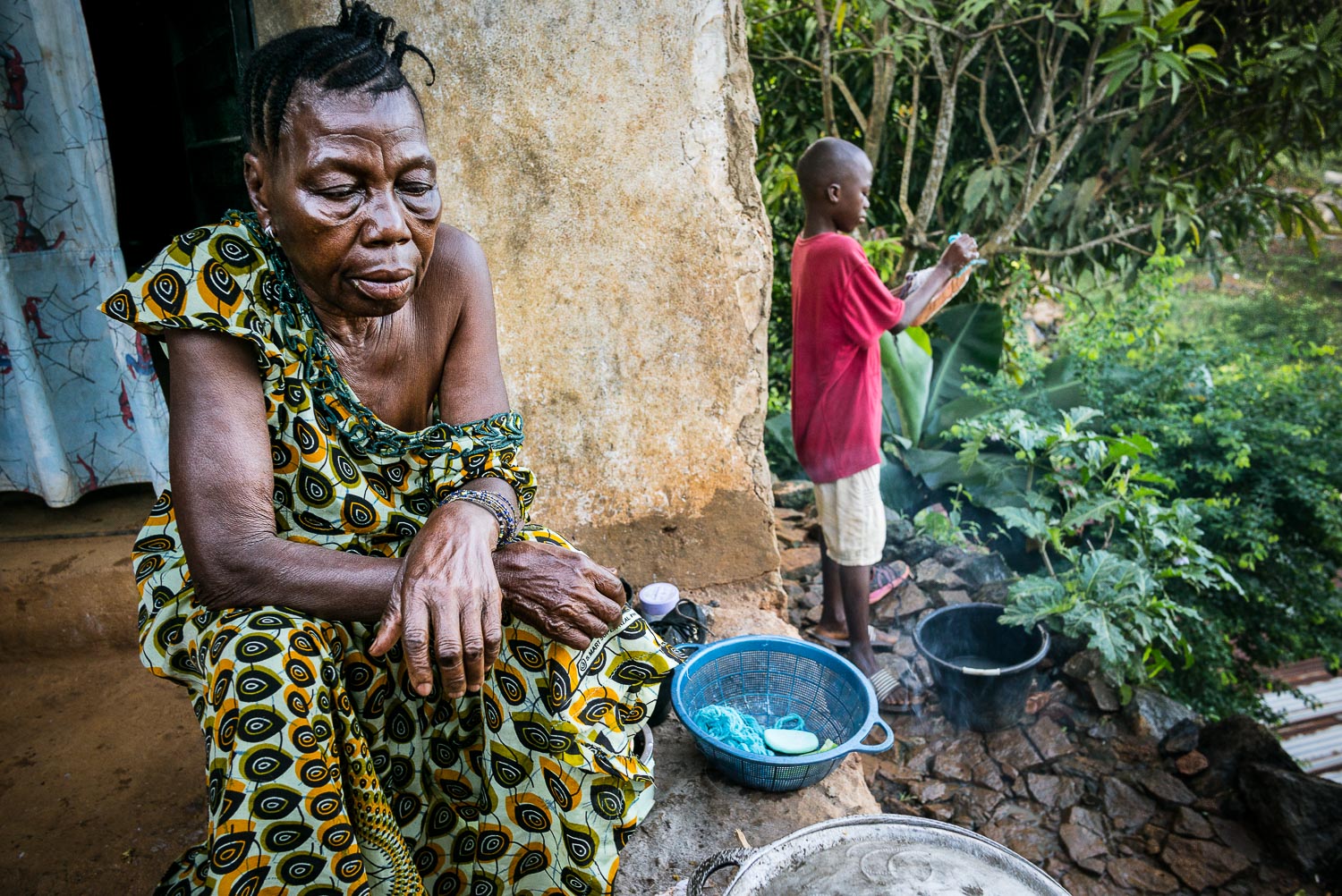 November 2015. Francis poses in front of his home with his grandmother Nidia as he prepares to walk to school. After being admitted to a local charitable school, he's become a stellar student, and extremely hardworking by report of his teachers. When asked what he's most proud of, his answer is immediate--his good grades.