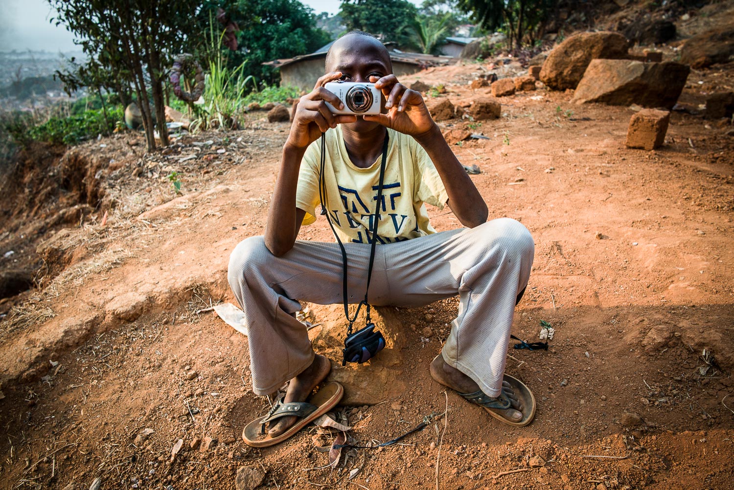 pril 2017. Francis Yorpoi, photographer, behind his home in the George Brook neighborhood of Freetown, Sierra Leone.
