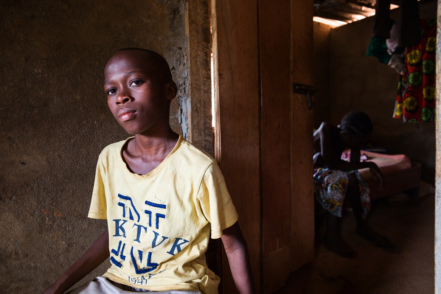 April 2017. Francis at home. Francis' school attendance these days has become sporadic. He suffers from malnutrition and recurrent bouts of malaria and typhoid, which are only partially treated, as the family cannot afford his medical care. On the r