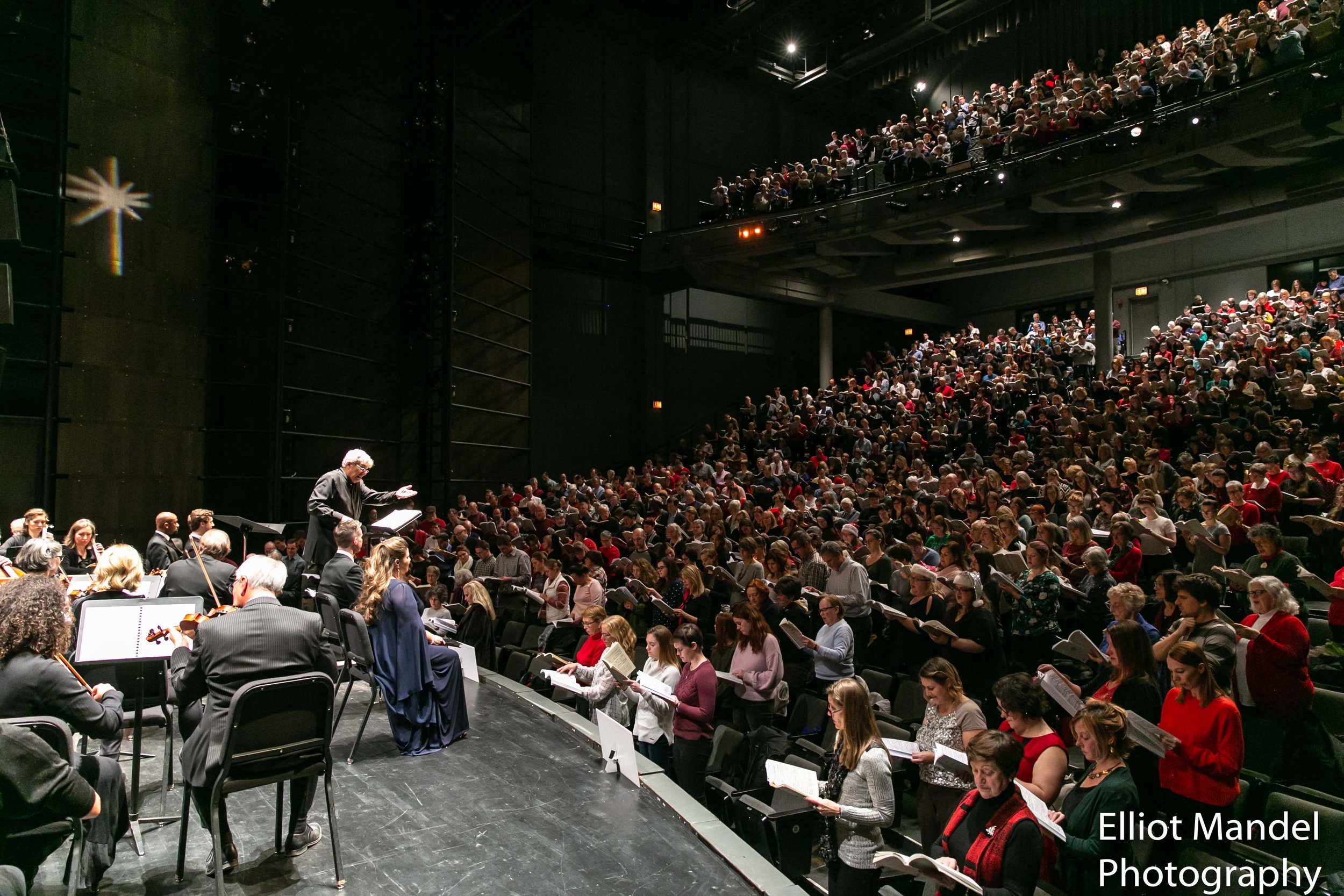  Maestro Stanley Sperber leads the masses in the International Music Foundation’s DIY Messiah (Dec 17, 2018), though one face stood out from the crowd… 