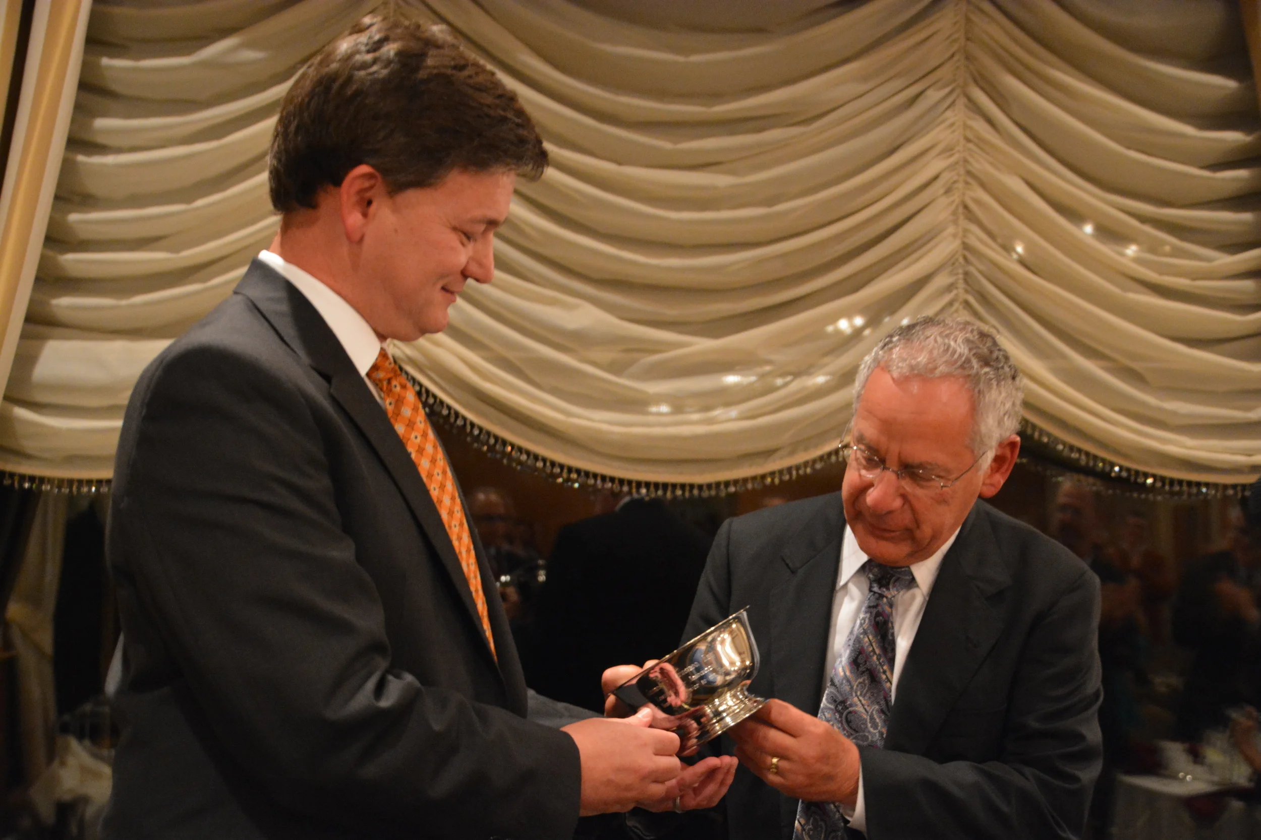LBA President Paul Klehm presents a 50-year distinguished service award to former president, Jim Krasnoo