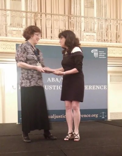 Martha Delaney (L), Deputy Director, Volunteer Lawyers Network