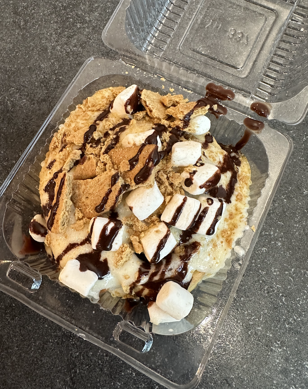    Campfire S;mores - Marshmallow frosting topped with graham cookies, marshmallows &amp; chocolate sauce.   I ate it all in one sitting! The marshmallows were most enjoyable. 