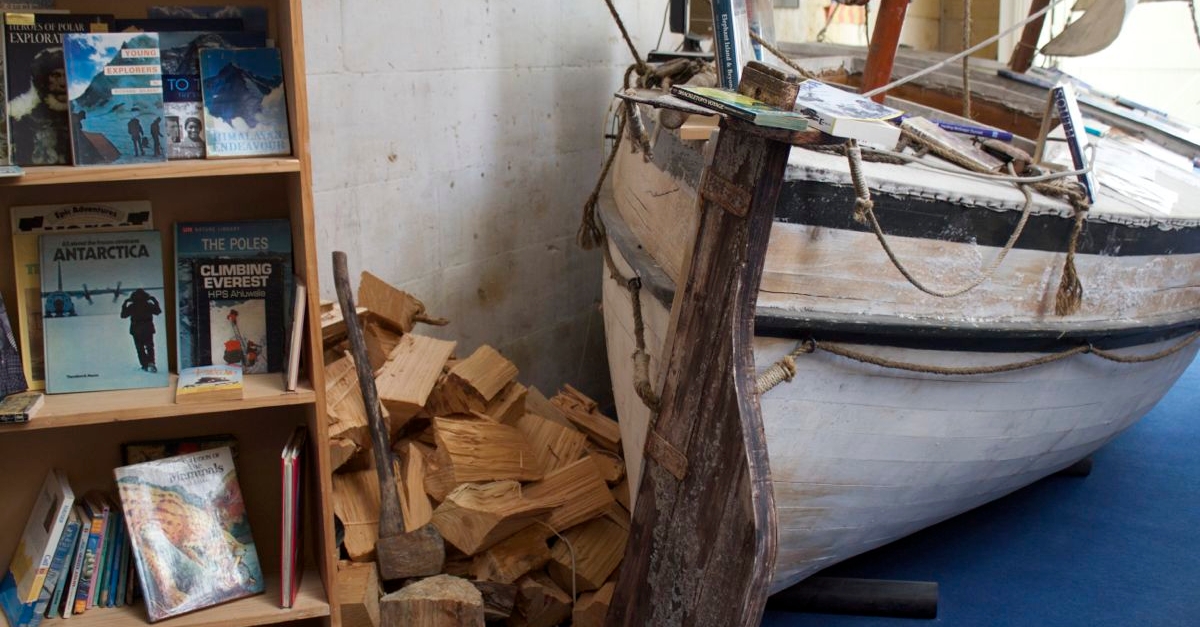 James Caird, with wood and an axe.