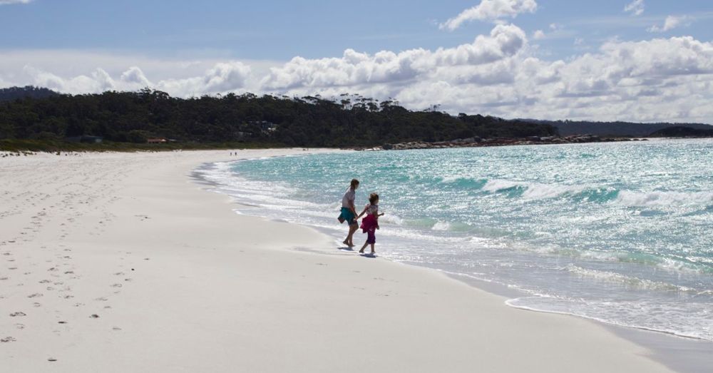 Girls on a pristine beach.