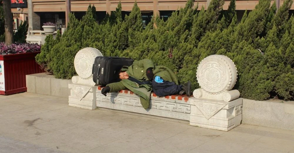 Man on a bench.