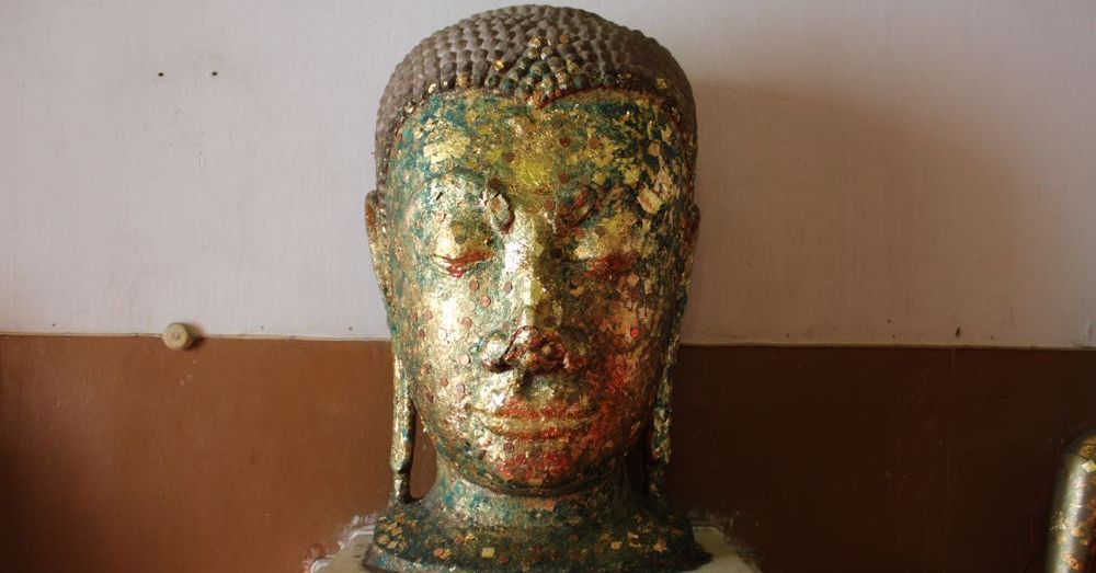 Buddha Head in Gold Leaf and Coins