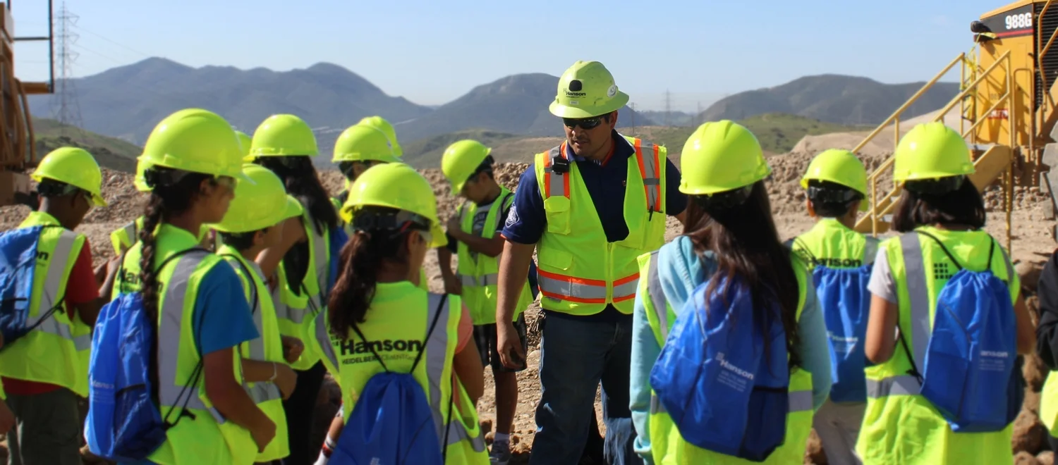 Eric Inouye explaining the different sizes of materials at the quarry.