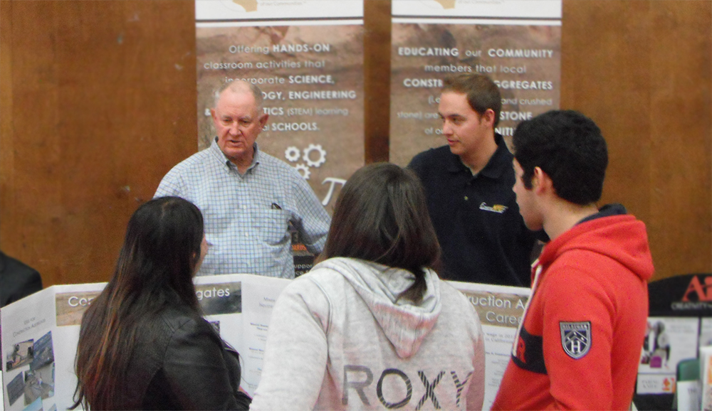 Warren Coalson and James DeCarolis speaking to high school students about careers in construction aggregates.