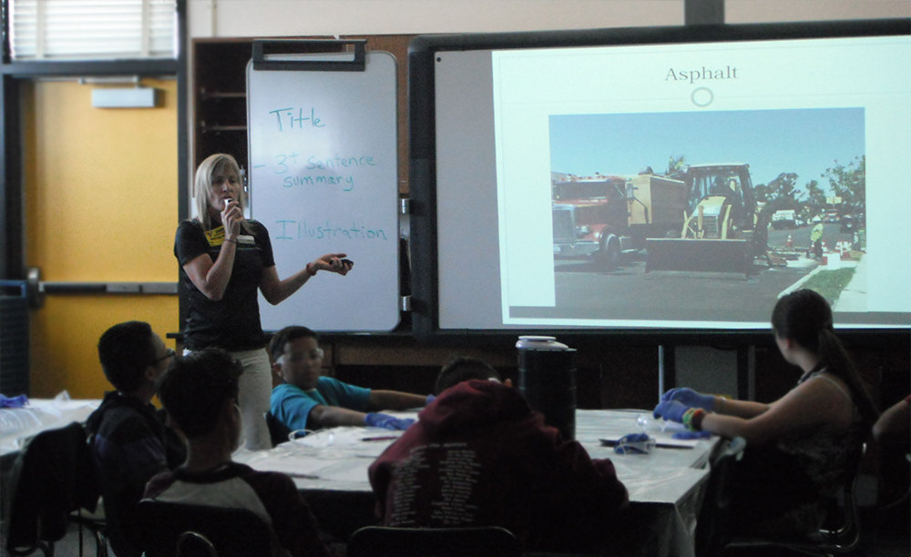 Crystal Howard presents information about local construction aggregates to eight grade students at Jean Farb Middle School. Photo by Alyssa Burley.