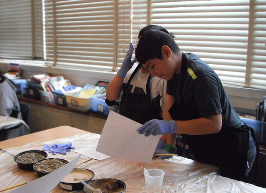 Fifth-grade students at Central Elementary finishing the math portion of the sieve analysis.