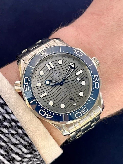 Omega SMP 300 Grey Wave Wrist Shot.jpg