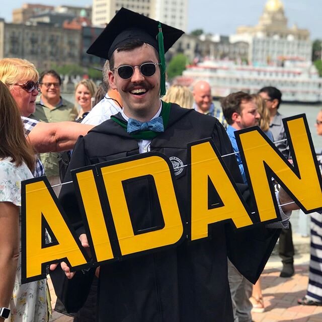 When you ask a random stranger &ldquo;Hey can we borrow your sign?&rdquo; You know you graduated from Art School. Our hearts are bursting 💛 so proud of @beanaidan and the SCAD Class of 2019 #scadgraduation #industrialdesign #furnituredesign #masterp