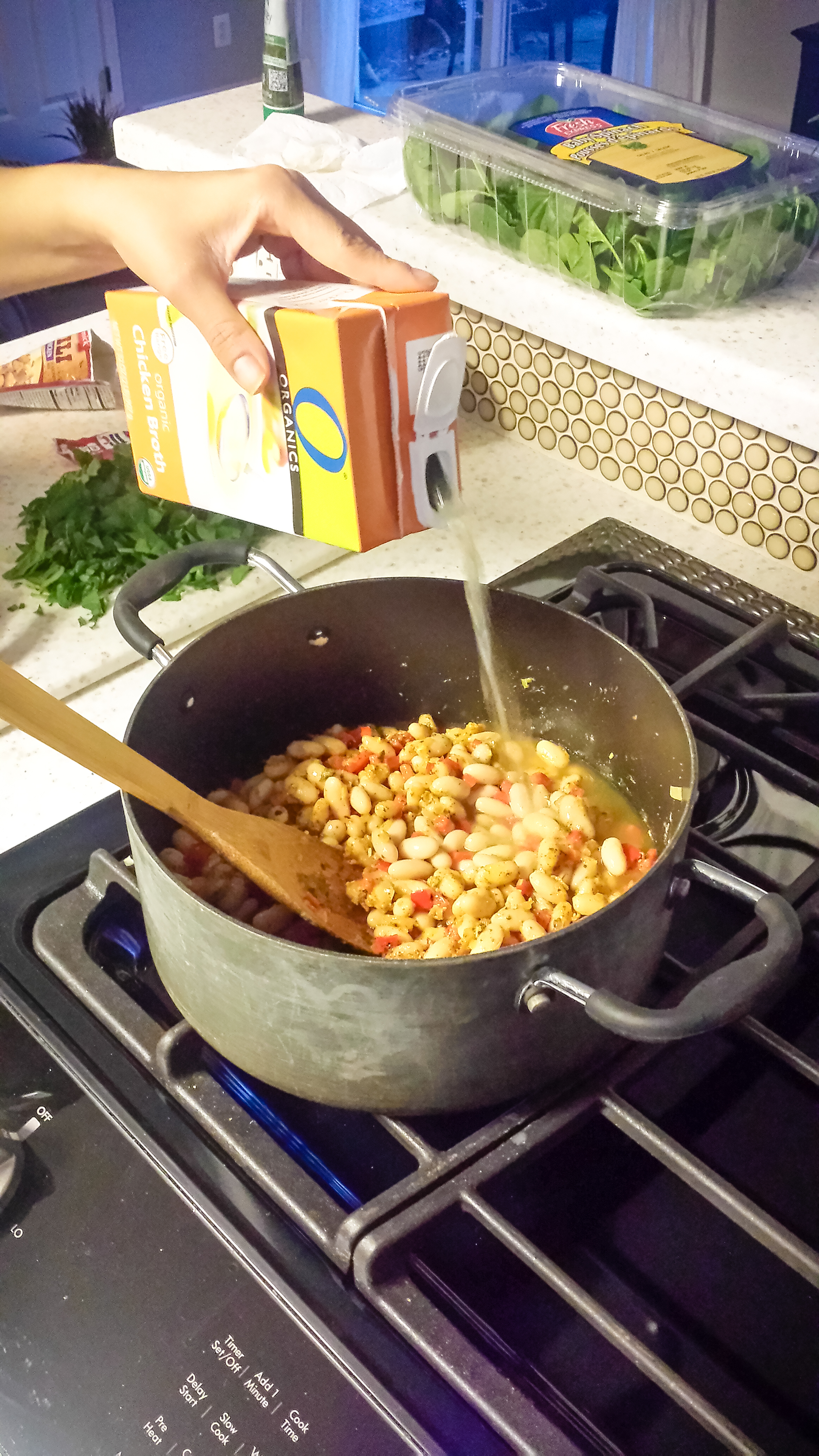 Add chicken stock, stir, cover and simmer