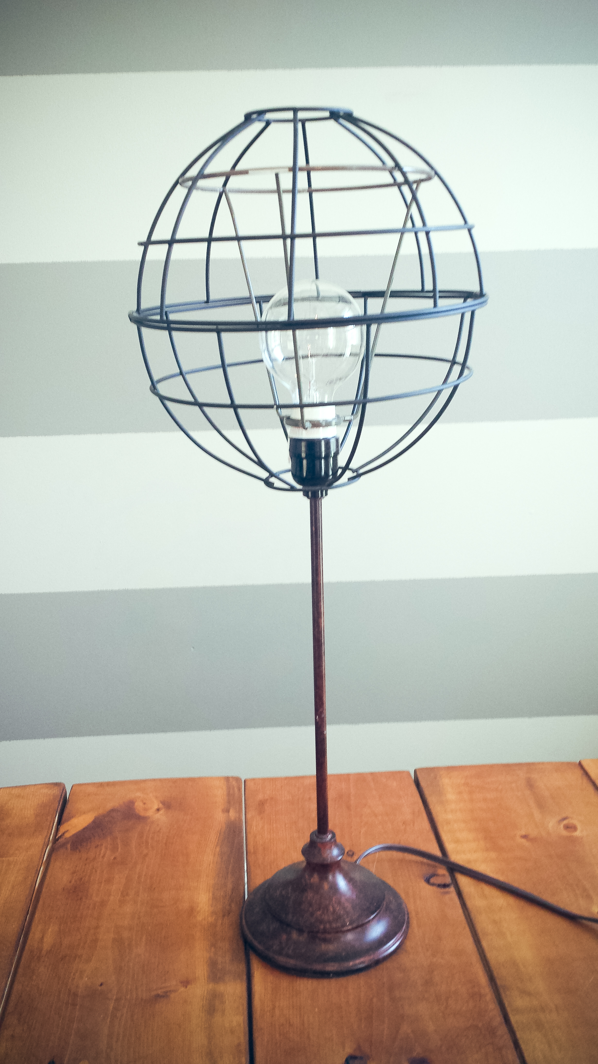 And there you have it! A brand new lovely lampshade! You could also paint the harp so it's the same color of the baskets. 