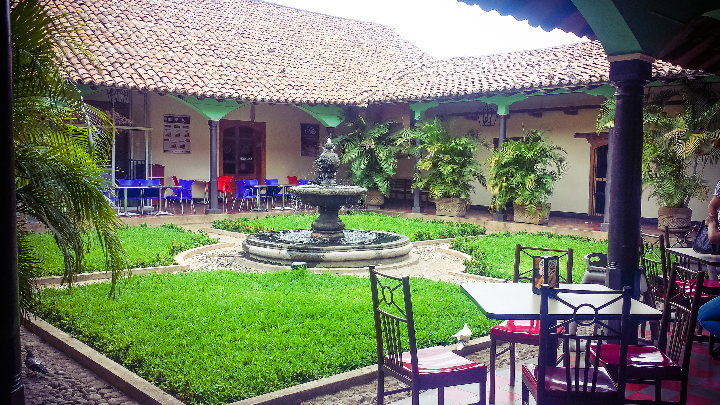 Courtyard inside a food court. In Leon, business have to maintain the colonial structure and look of any building they own. 