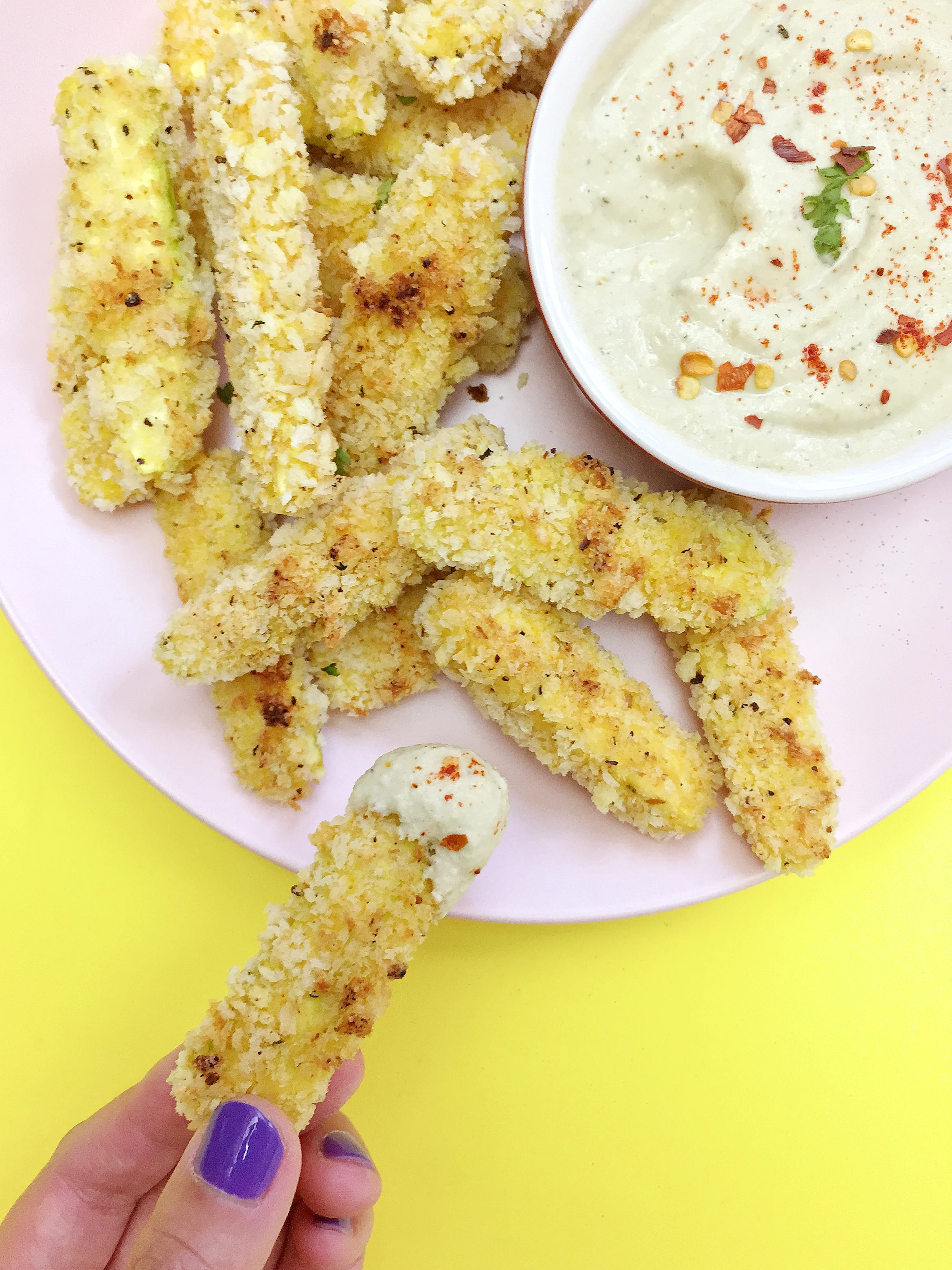 amy_chen_design_vegan_baked_panko_zucchini_sticks_fries_garlic_cashew_cream_sauce_dip_hand.jpg