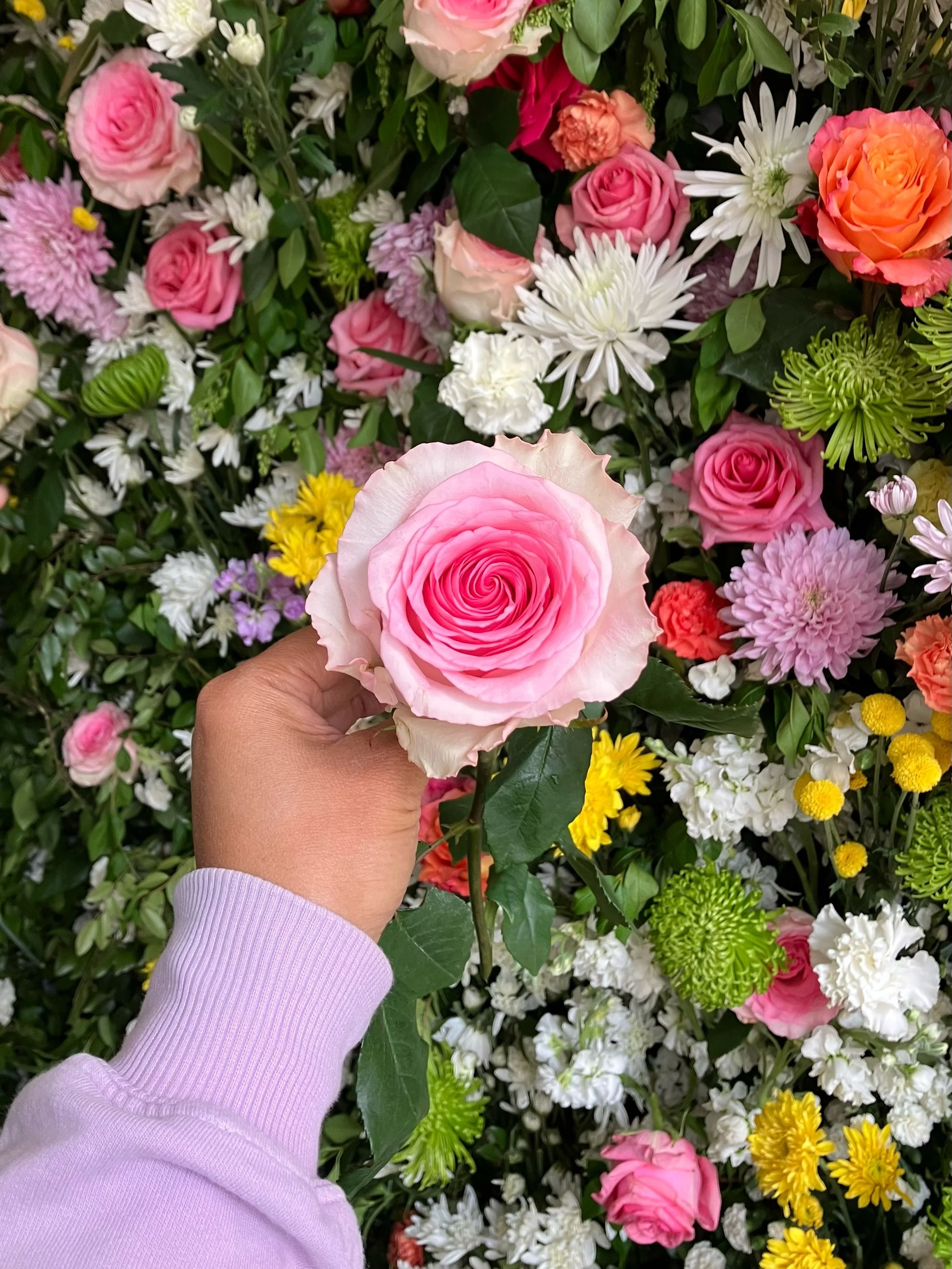 &ldquo;design is dead&rdquo; they said, so @figma threw a funeral last weekend 💀💐🪦

we were asked to select a colored flower from the overflowing buckets on the sidewalk, then stood in line waiting for our turn to place it on the &ldquo;casket.&rd