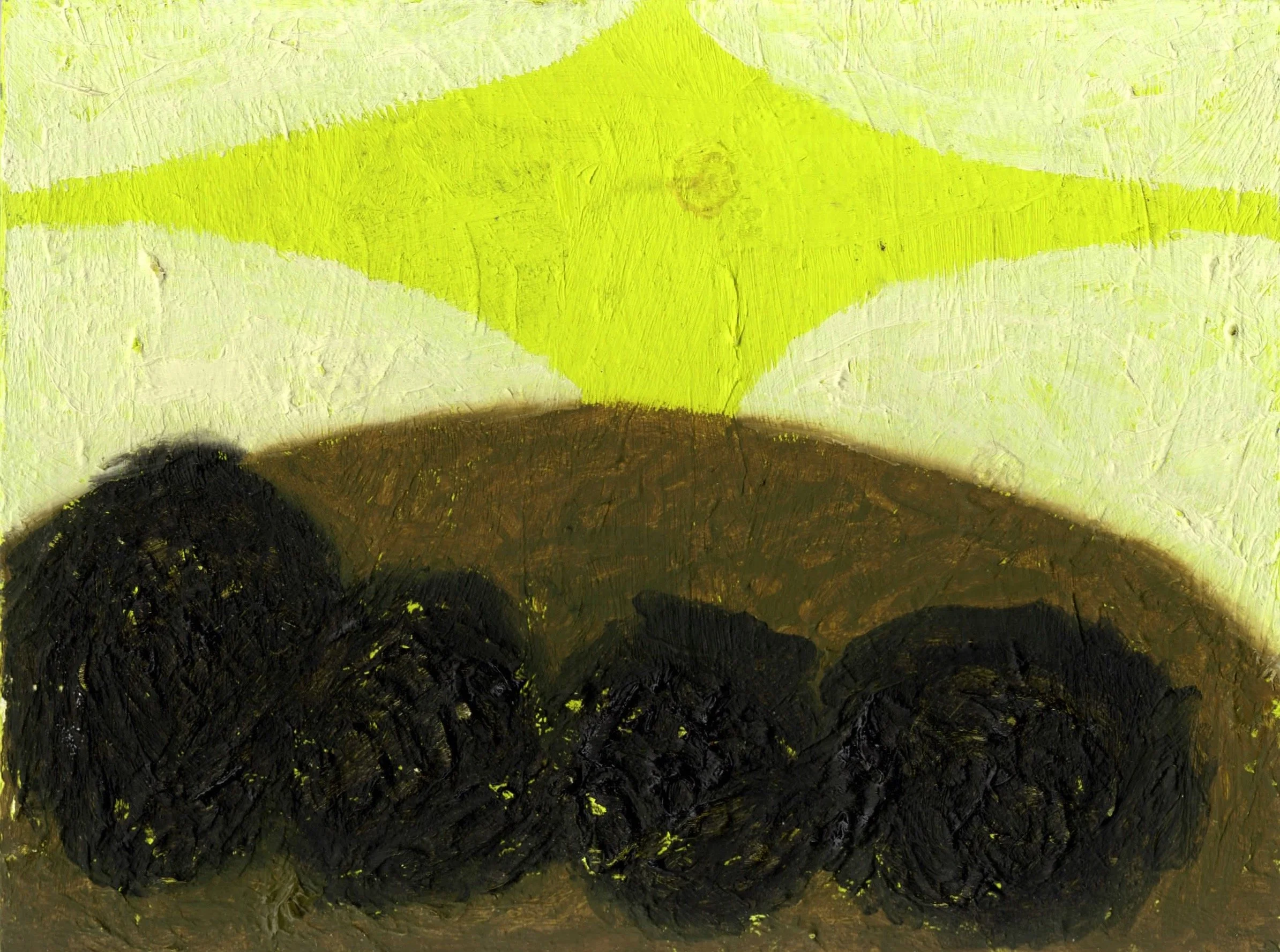 the sun over rolling hills