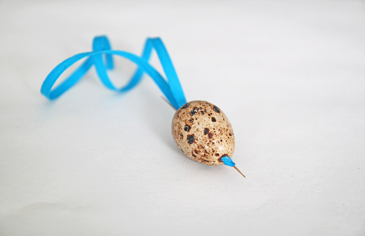 DIY Peacock and Quail Easter Egg Ornaments, stringing the egg, by Justine Hand and Angela Liguori.jpeg