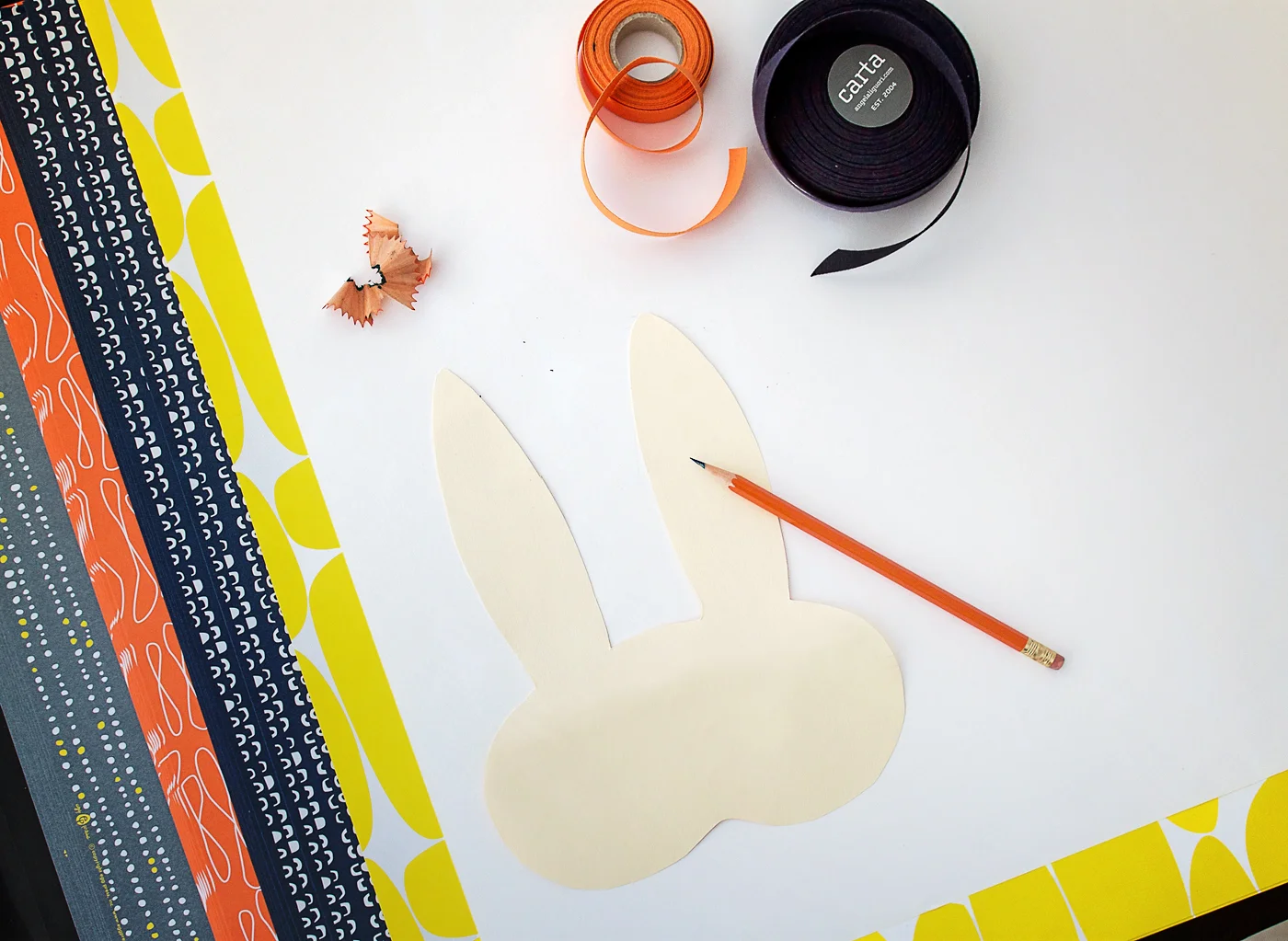 Step 1: Using a flexible, lightweight cardboard or poster board (we used a manila envelope) make a simple sketch of a creature or critter of your choice. Cut this out.