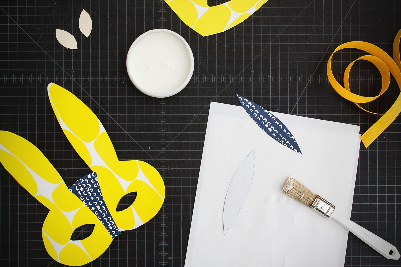  5: Apply glue and paste you accent pieces onto your mask.