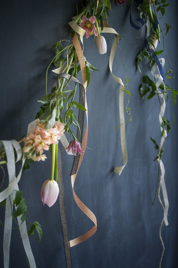 Above: Also dramatic on Studio Carta black chalk wall. Here we opted for an undulating drape.