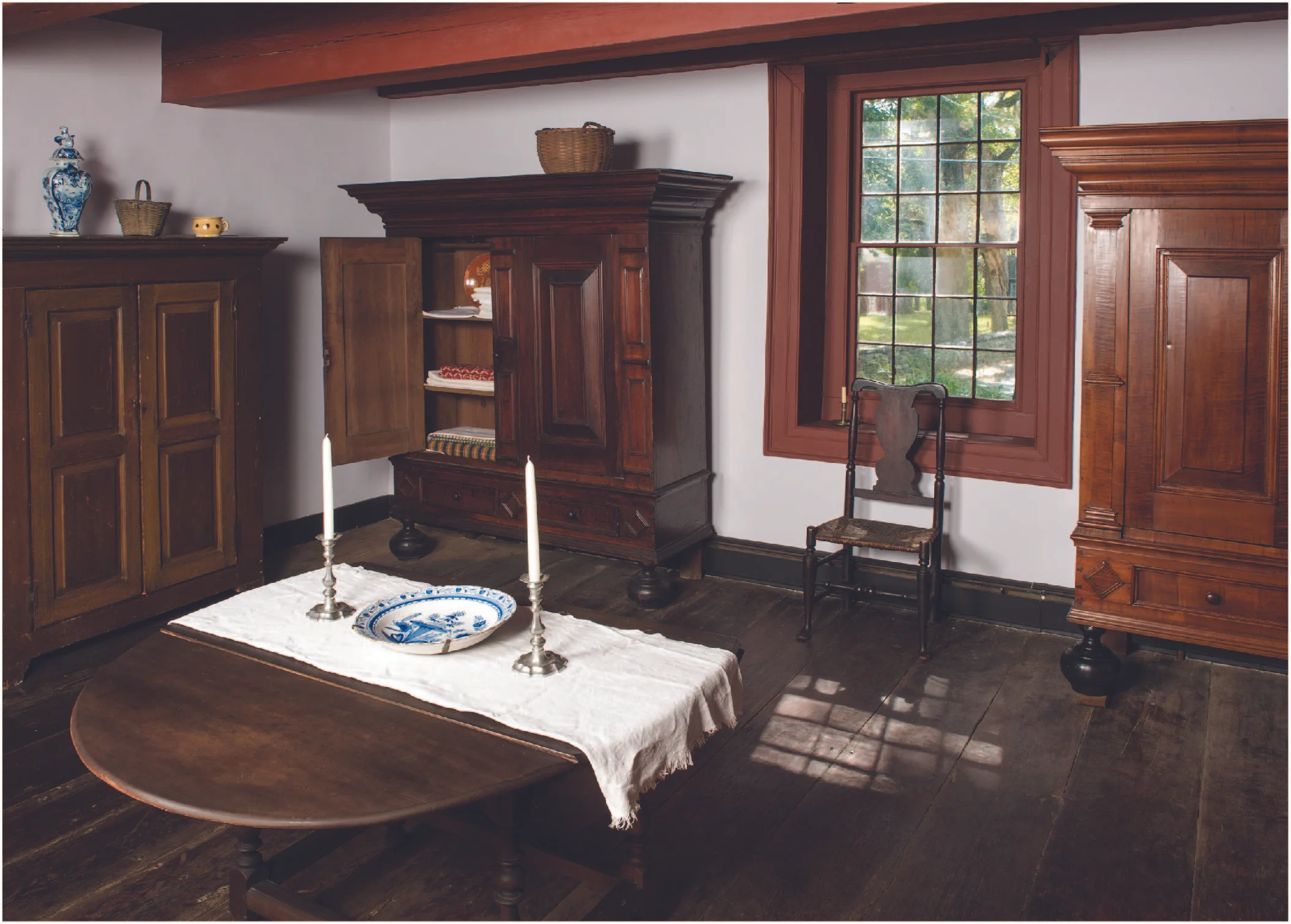 Installation of kasten at the Jean Hasbrouck House, showing left to right a “country” kast on loan from Jeffrey and Sue Hoffman and kasten from the HHS Permanent Collection and the Reformed Church of Kingston.