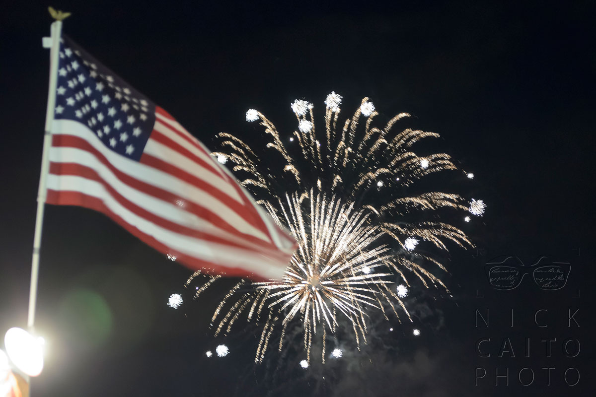 Sure, this could have been nice. No tripod, and I tried to focus on the firework instead of the flag. FAIL. f/2.8, ISO 1600, 1/15s exposure.