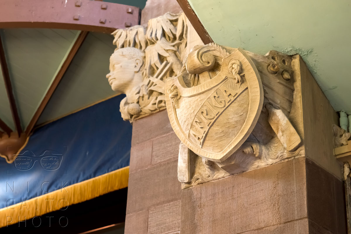 The four corners of the room had crests emblazoned with the continents. Africa, Europe, Asia, and Americas.