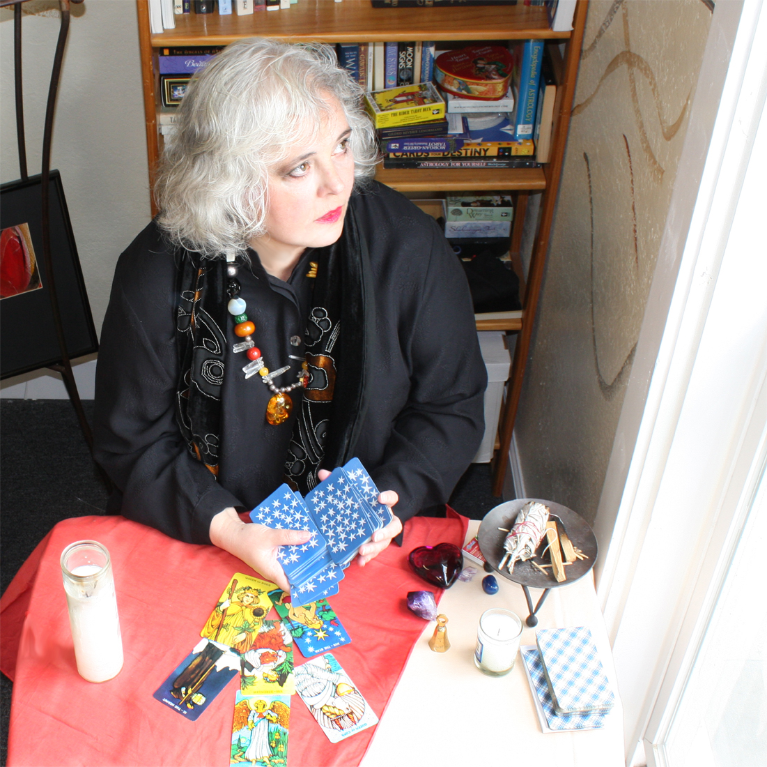 Mystical Medusa reading and conversing with her Oracle.