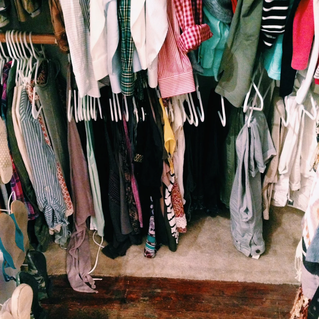 Before: Disregard the top half of the closet in both pictures. It belongs to my honey and he isn't quite sold on the idea of a capsule wardrobe.