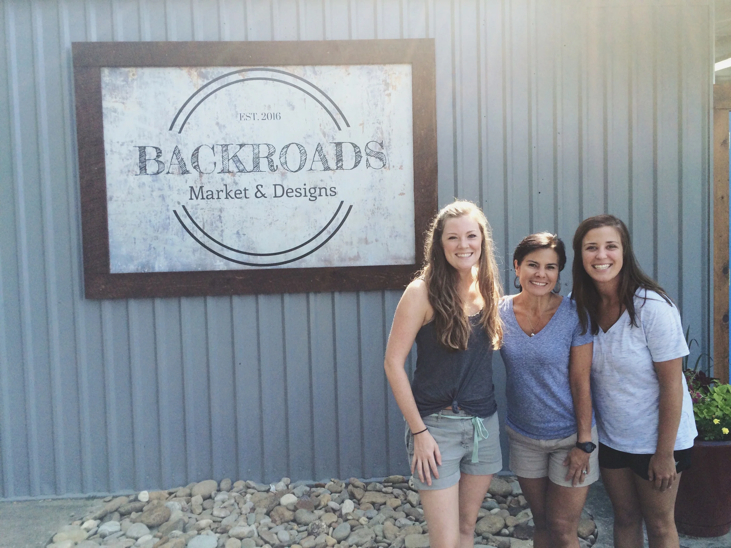 Caroline, BackRoads Market owner Kerry Myers, and Katie 