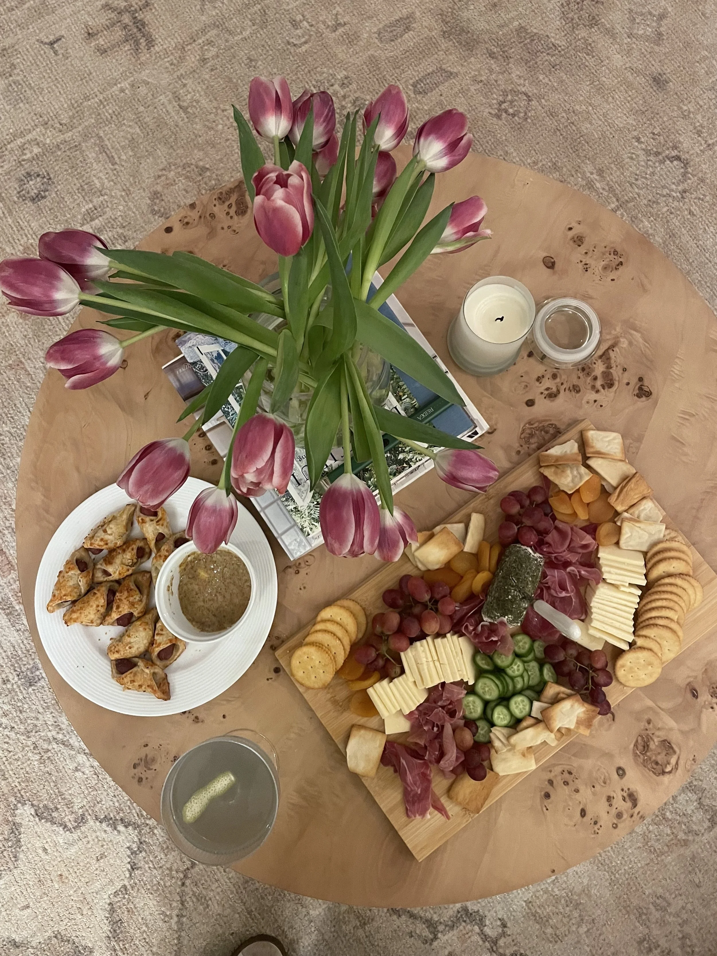 No one will know what was store bought or hand made. Presentation is everything! Food + florals + candles is a basic formula for hosting success.