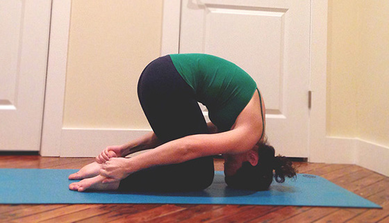 See a theme here? Animals are a wonderful source of inspiration, and have the best stretches! ;) -After Cat/Cow, stay on your hands & knees and sink your hips back to meet your heels (tops of the feet stay on the ground). Make sure your knees are touching and place your forehead about a hand's-width in front of you on the ground. -Reach back to grab around the outsides of both your ankles and hold. -On an inhale, lift your hips into the air, rolling onto the top of your head, and kick your heels into your hands. This will create a delicious upper back stretch in between your shoulder blades. -Be sure not to put too much pressure on your head as most of the strength here is in your legs, and the grasp of your hands on your heels. -Stay here for 5 rounds of breath (one round = an inhale and an exhale).