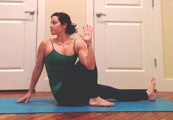 Twists are amazing for the body and very detoxing, so this perfect after hours of having your body in one position. -Sit on your mat with both legs extended in front of you, feet flexed. -Bend your right knee and grab hold of it with your right hand. -Inhale and lift your left arm into the air, then exhale and twist to the right bringing your right hand to the ground behind your hips, and your left elbow to the outside of your right knee. If bringing your elbow around doesn't seem feasible, just hold your your right knee with your left hand. - Make sure you have a straight spine here and gaze over your right shoulder. -Stay here for 5 breaths, and on each exhale, inch your left elbow further and further across your right knee. After 5, switch and do the other side. -And keep that left foot flexed, don't forget about it! :) 