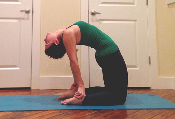 If Bow Pose doesn't sound like your cup of tea, you can try.... Camel Pose! -Kneel at the top of your mat, legs hip-width apart, tops of the feet on the mat. -Rest your hands on your hips, roll your shoulders back, and begin to move your hands onto your lower back. -Inhale lift your chest and gaze up, and on an exhale slowly begin to walk your hands down your back past your booty, thighs, calves, finally to meet your heels. -Keep your pelvis reaching forward, arms straight, and let your head fall back (if it's comfortable). -Stay here for 5 breaths, then move into child's pose right after to stretch out the lower back.