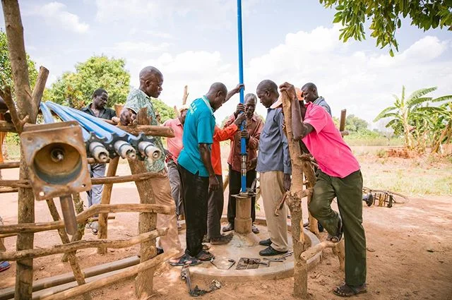 Typically, I work by simply showing up and capturing whats going on, but this was even one step further. .
We were visiting a school @LifewaterInternational works with in rural Uganda (partnering to provide bathrooms and a handicap-accessible water source), when we walked outside the school grounds to the nearest water source. And to the surprise of not only me, but to all the local Lifewater staff, the well was being repaired.
.
It took a couple seconds to sink in, but I quickly realized, what I was seeing- the Lifewater model was working! You see, there is a always a lot of talk about sustainability, but when you see it happen, its incredible. Lifewater works with the community using local technology, training local influencers, using local leadership, and where the community contributes into the cost of the water source. Then a committee is formed which oversees monthly payments (that everyone can afford) and that are saved for future well maintenance and repair.
.
And this is what we happened upon. The well had broke. The community was trained. The committee had saved the money. Now, repairs were being made solely by the community and no outside help was needed. That’s sustainability.