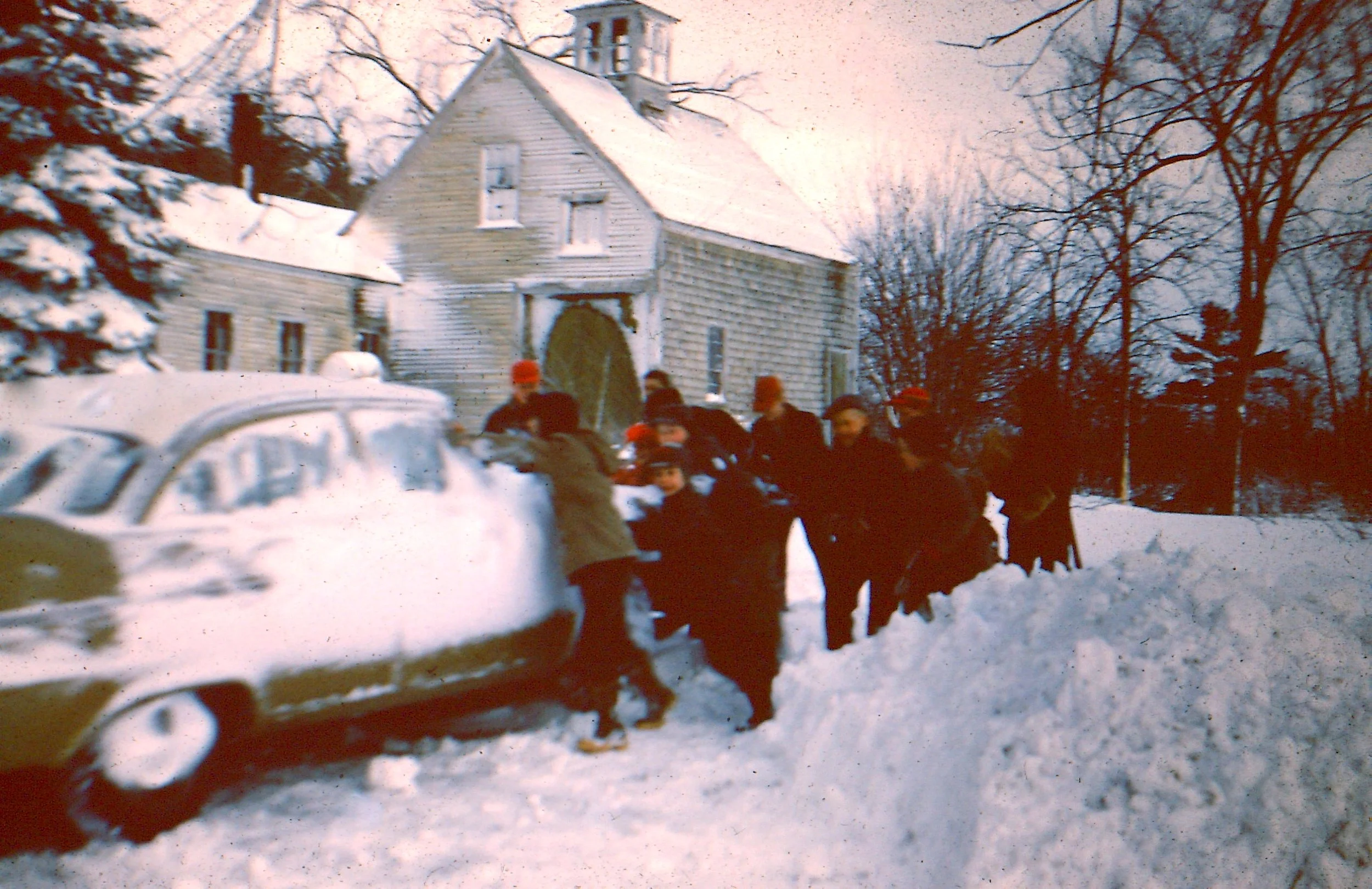 Pushing Charlene Elliott's car out of snow 1961.JPG
