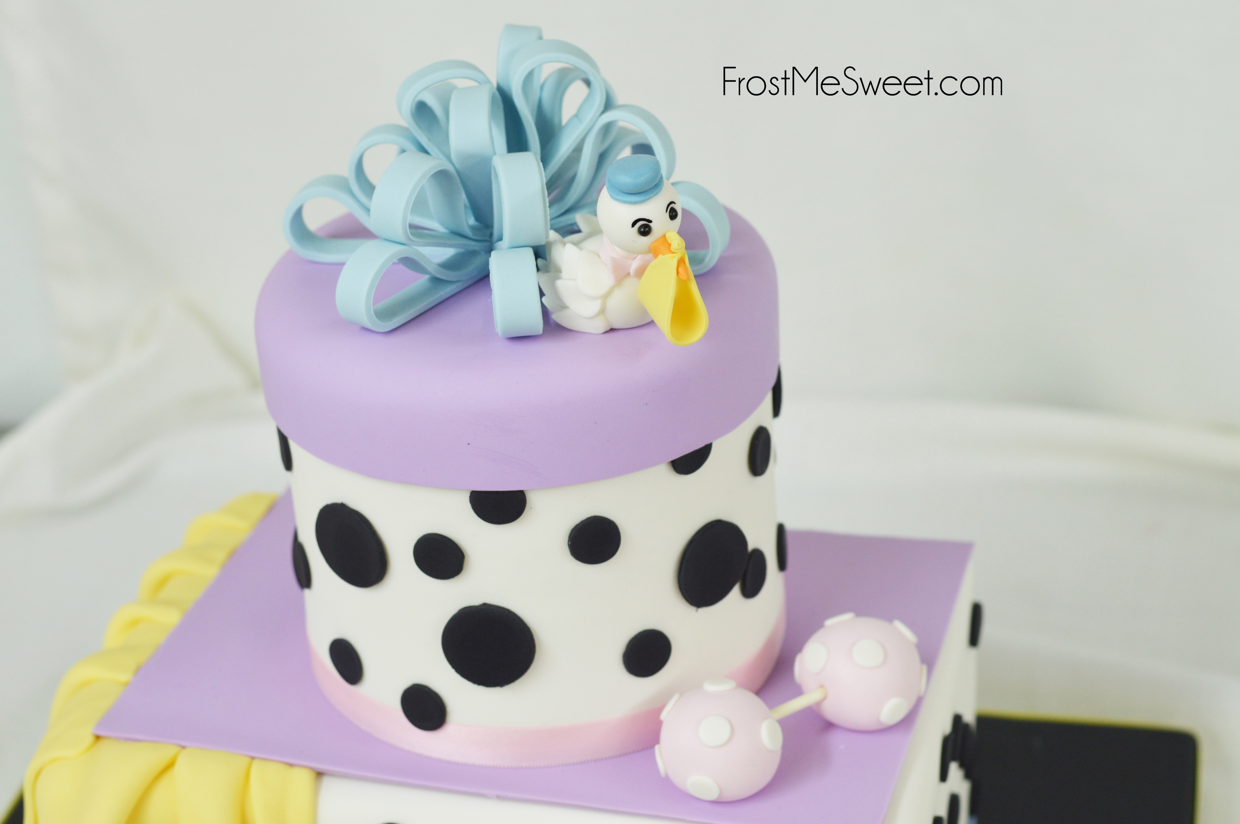 Stork & gift baby shower cake