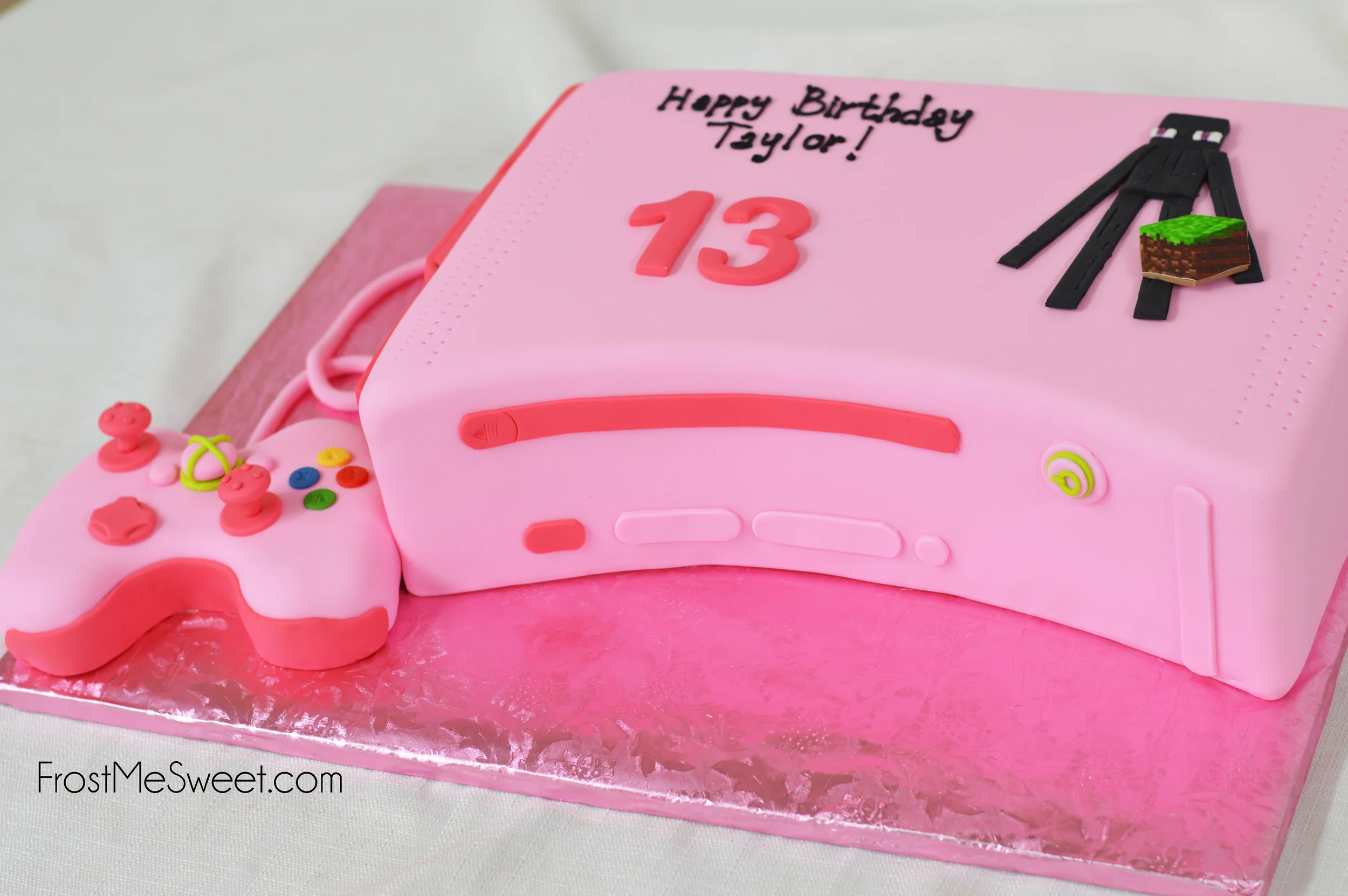 Pink playstation Xbox cake