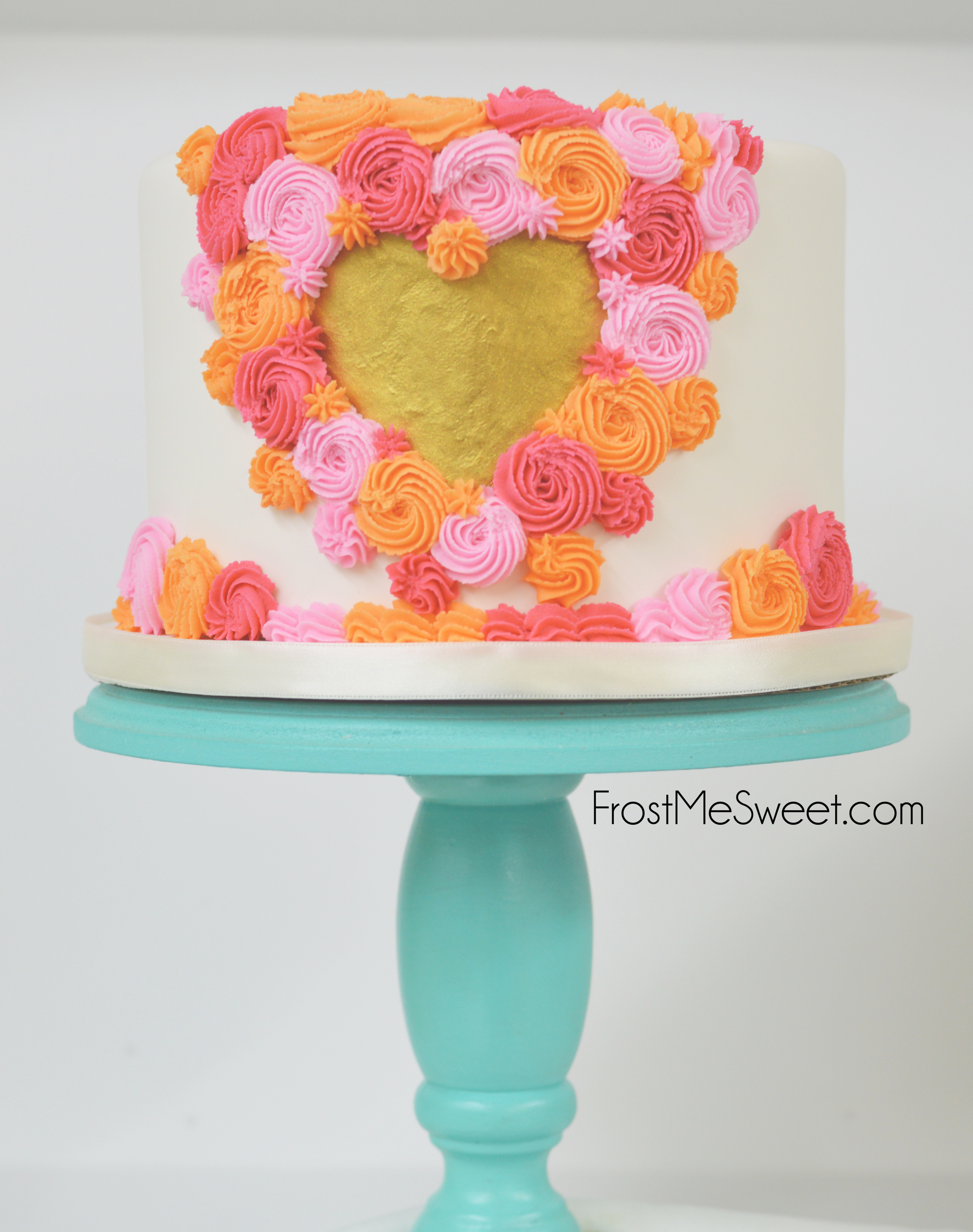 Pink coral gold heart cake