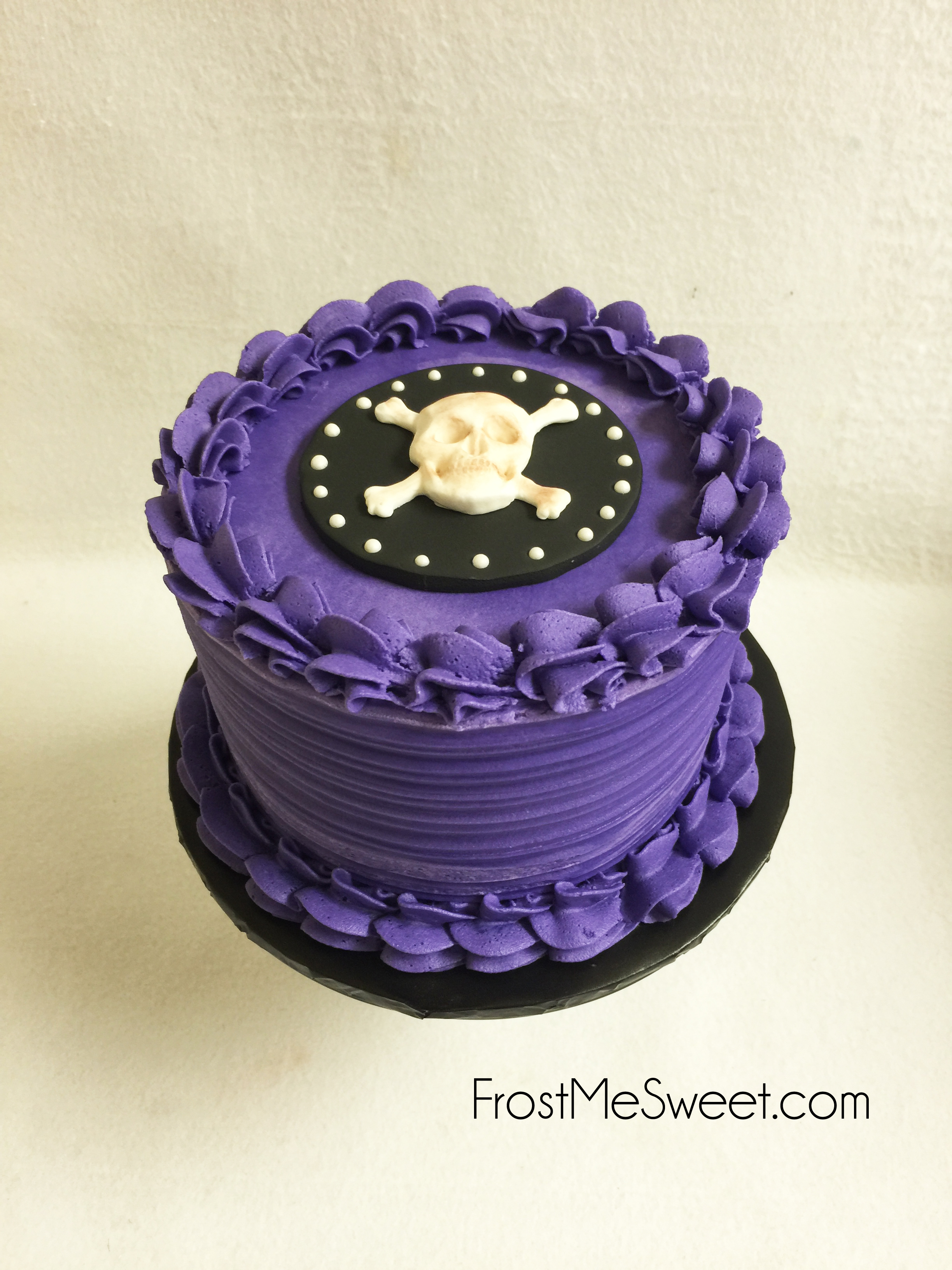 Skull and crossbones girl pirate cake