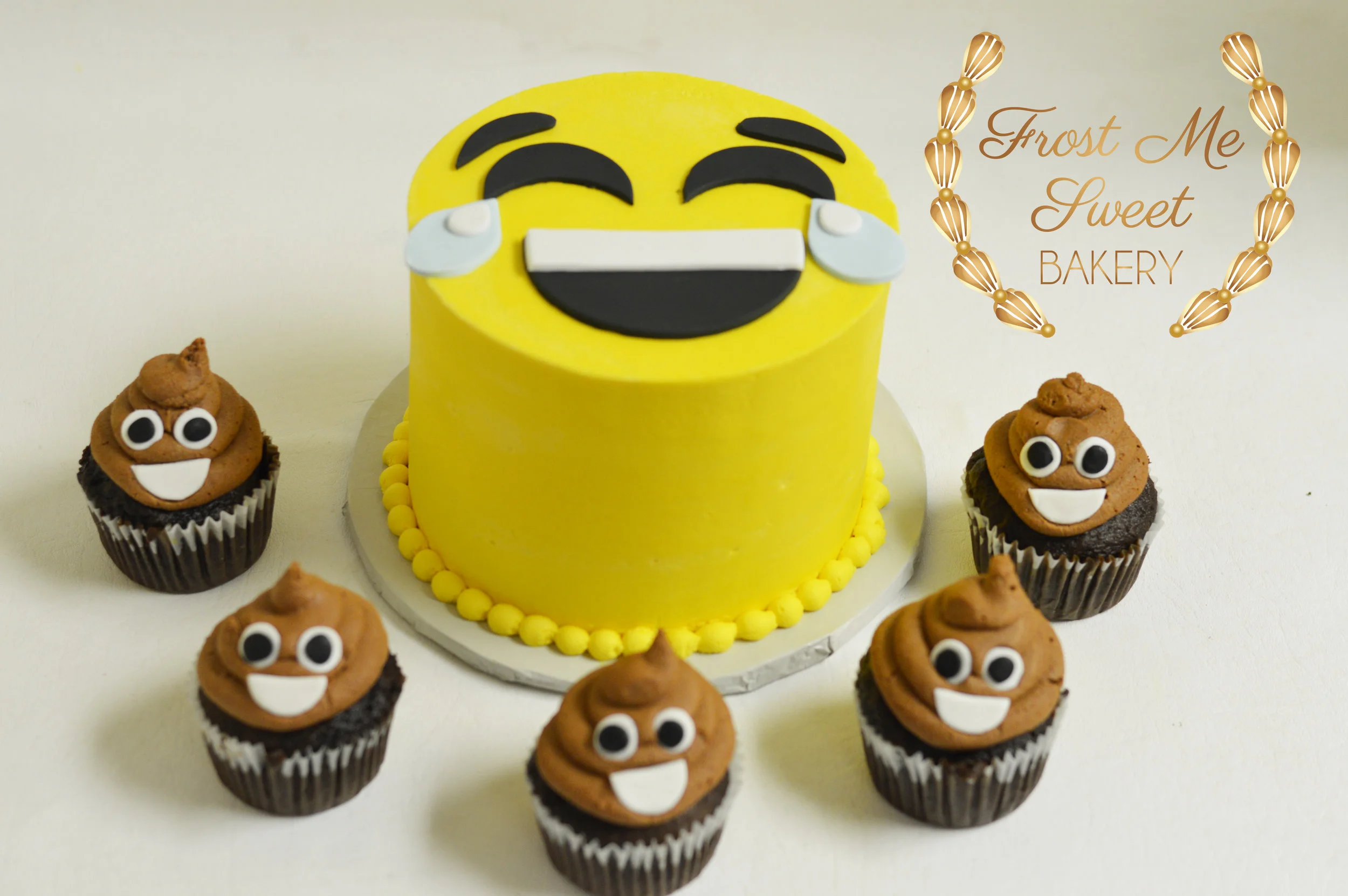 emoji cake and cupcakes.jpg