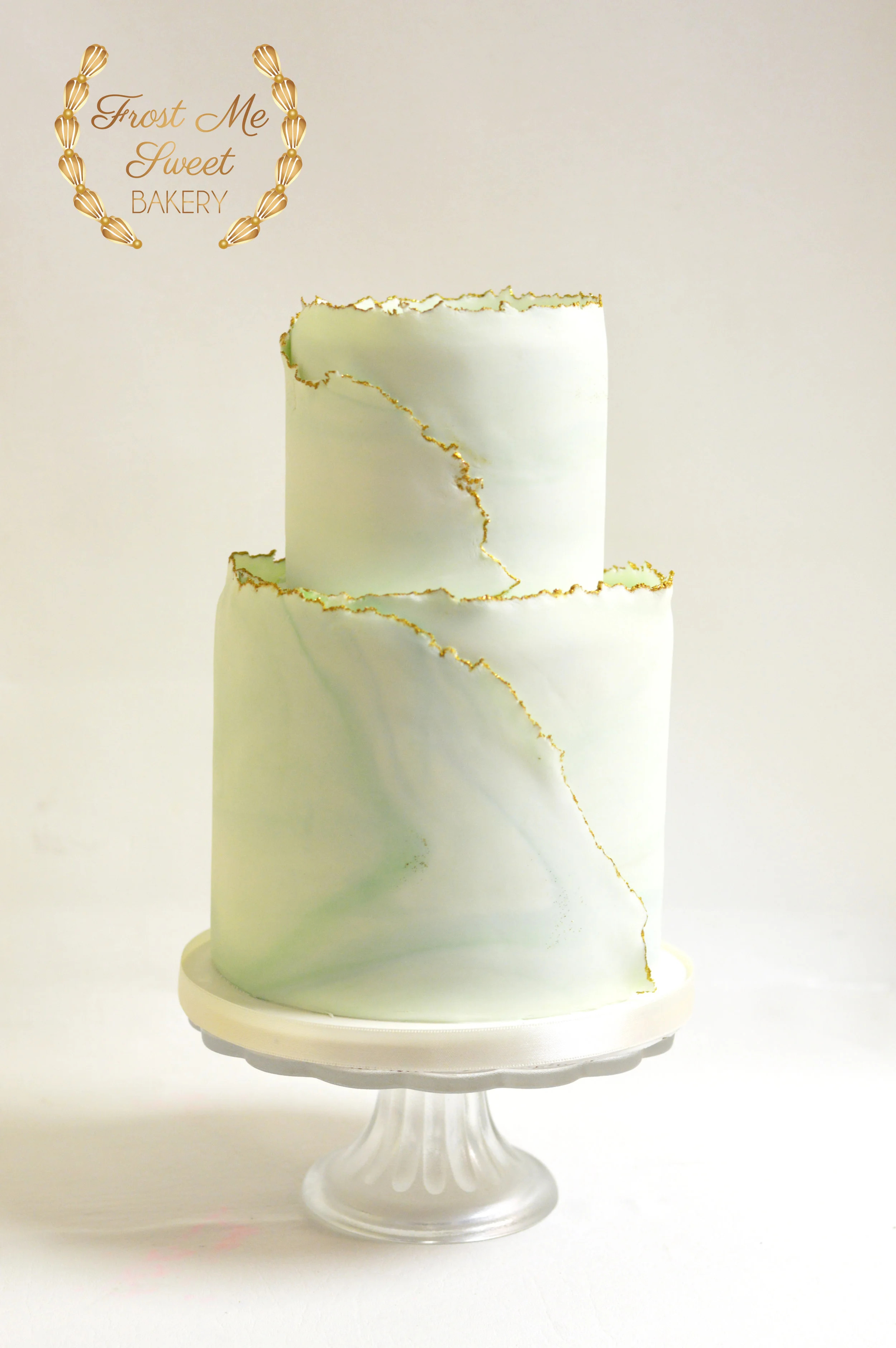 sage marble with torn gold edges bakery background.jpg