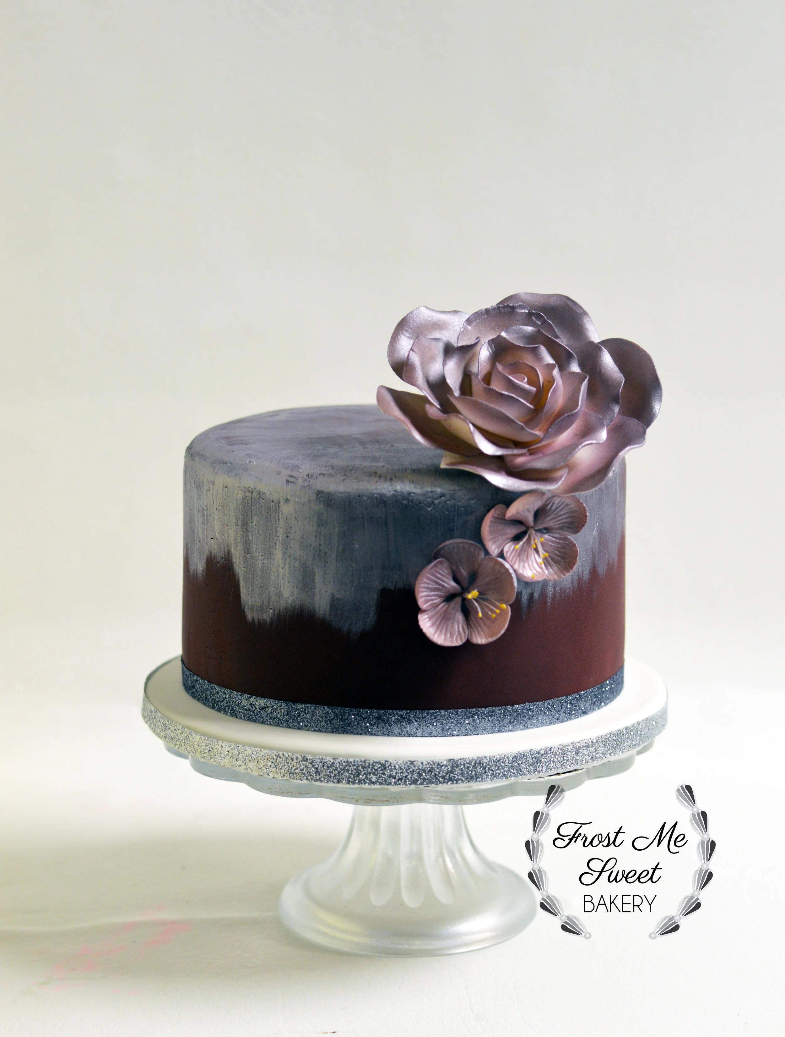 silver and burgundy cutting cake.jpg