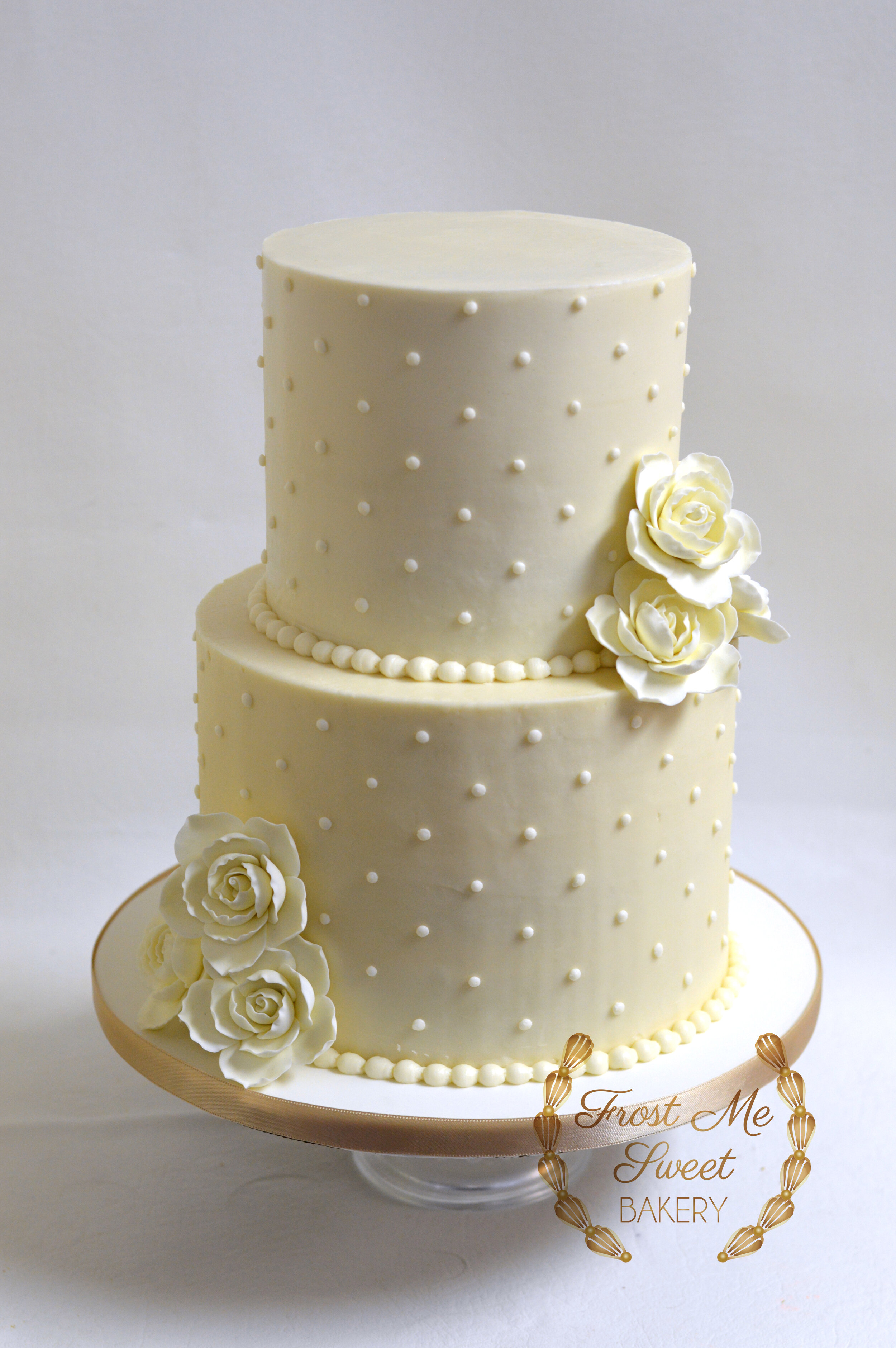2 tier buttercream swiss dots.jpg