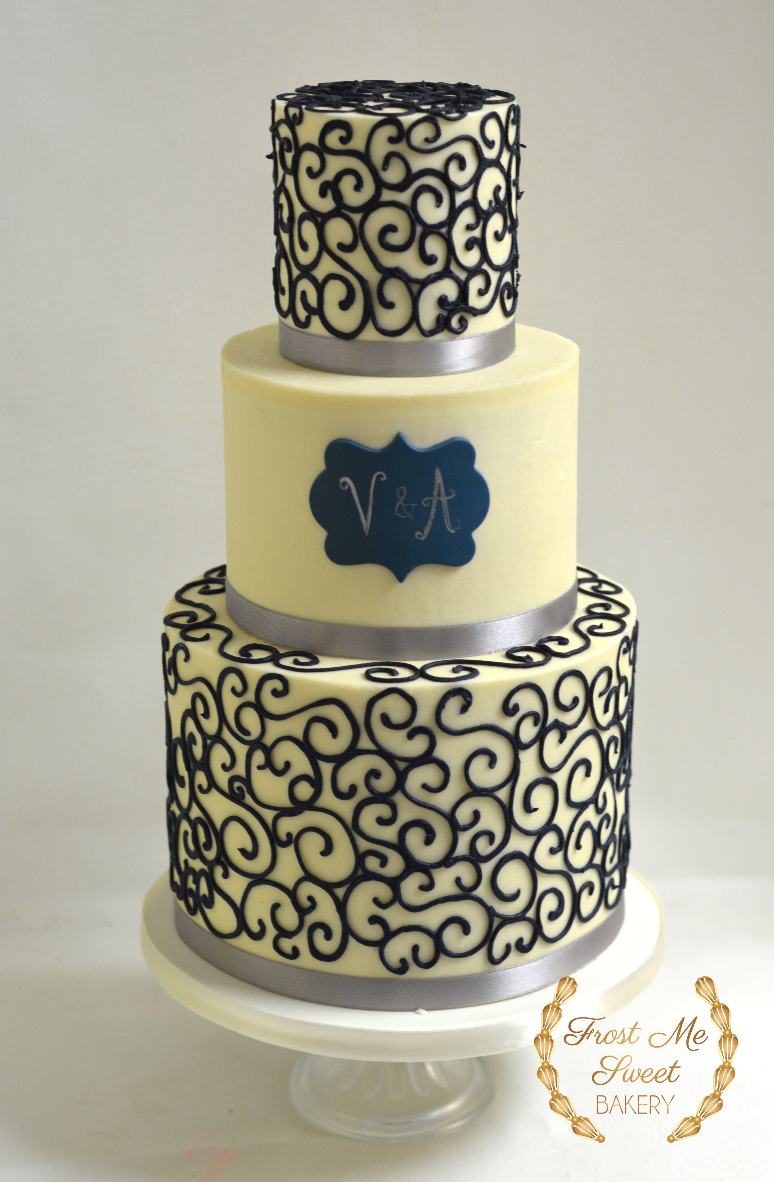 Blue scrolling wedding cake