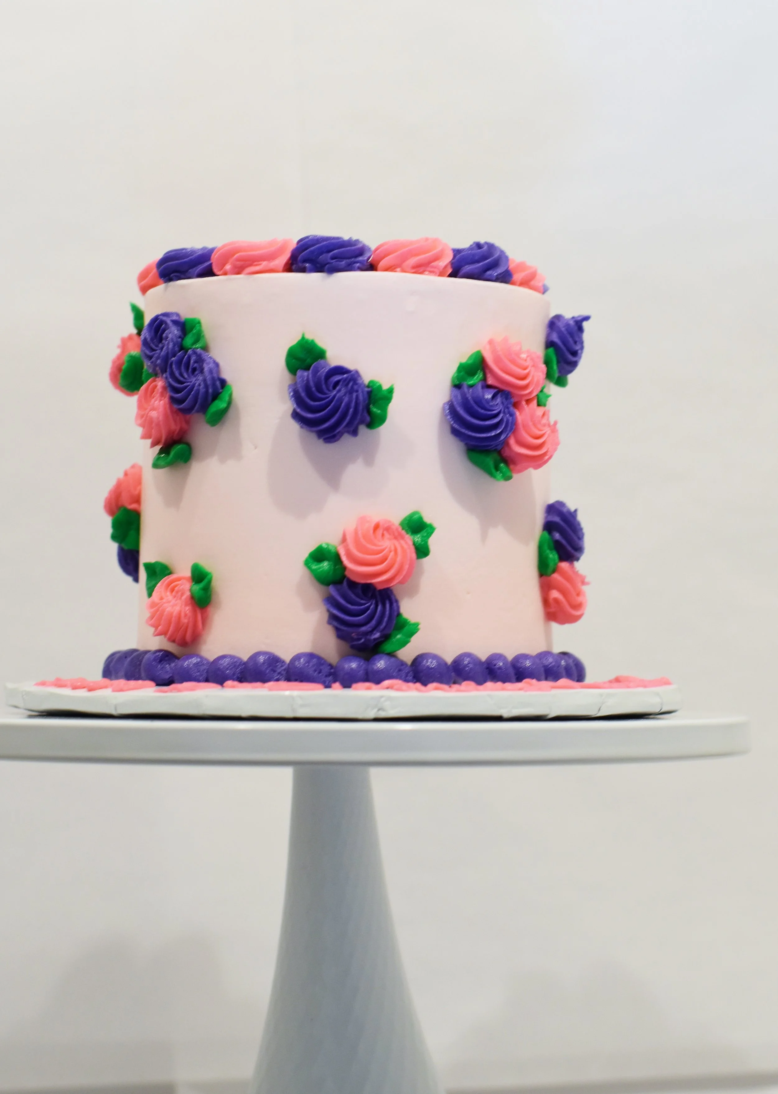 CUTE LITTLE ROSETTE FLOWER CAKE.jpg